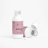Sérum Facial de Retinol y Péptidos de Ivalro: frasco tumbado junto a su tapón