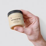 Ivalro Raw Shea Butter: hand holding the jar facing forward