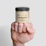 Ivalro Raw Shea Butter: hand holding the closed jar